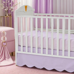 Brandream scallop edge crib skirt in purple adds refined nursery elegance.