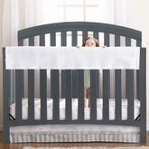 BreathableBaby RailGuard long-panel on crib rail provides teether protection and coverage.