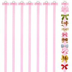 Bremorou pink bow holder on wall keeps bows neatly organized.