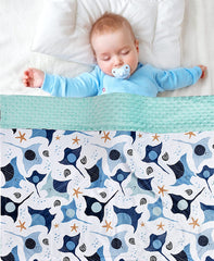 Brenaly crib and stroller blanket shows versatile travel use.