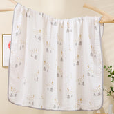 Brnabiou ultra-soft muslin blanket with moon-star motif, breathable and cozy for baby swaddling.