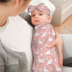 Goose swaddle fabric close-up shows soft, breathable polyester for delicate skin.