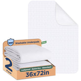 Brosive bed pads laid flat on a bed protecting sheets from spills.