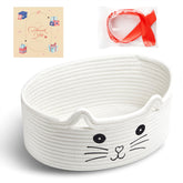 Bufims small woven cat gifts basket with storage keeps cat toys neatly organized.