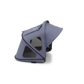 Bugaboo Breezy Sun Canopy with ventilation panels keeps baby cool on sunny strolls.