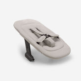 Bugaboo Giraffe padded seat insert for ergonomic seating from birth.