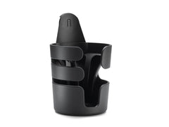 Bugaboo cup holder close-up securing a bottle upright during a stroll