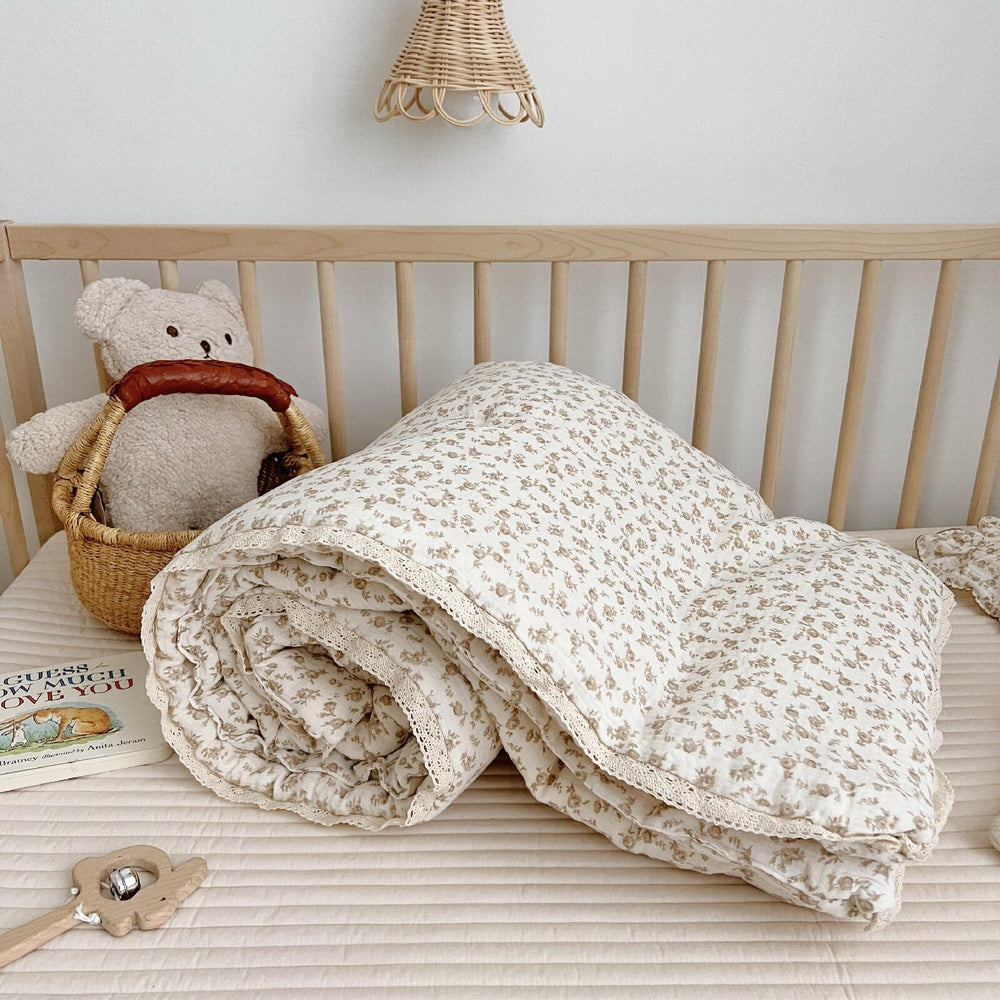 BuLuTu Carmine Flower Blanket close-up of plush muslin fabric and floral pattern for nursery