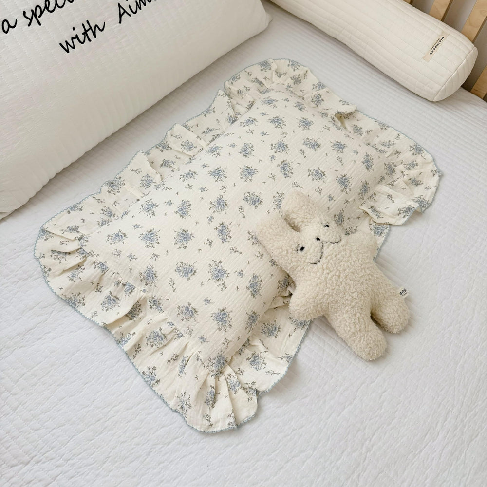 BuLuTu cotton muslin toddler pillowcase with blue flowers on a crib, 20x14 for nap time.