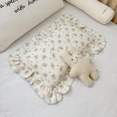 BuLuTu cotton muslin toddler pillowcase with blue flowers on a crib, 20x14 for nap time.