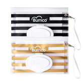 Bumco wipes dispenser in gold and black with wristlet for easy travel access.
