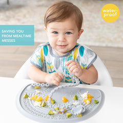 Bumkins SuperBib crumb catcher pocket helps catch spills.