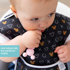 Adjustable strap on Bumkins bib provides quick, tug-proof fit.
