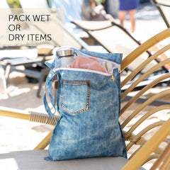 Bumkins Roamio snap handle enables easy attachment to luggage, strollers, or gym gear