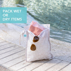 Bumkins Desert Boho wet bag on stroller clip for on-the-go storage.