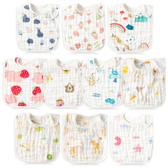 BUoonyer bibs peach pattern for drool control during feeding.
