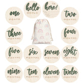 Burbell 3D milestone discs in green for timeless baby photos.