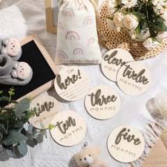 Burbell double-sided hello world milestone disc for versatile photo props.
