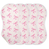 Burbuja pink bow muslin burp cloth front view, four-layer softness and high absorbency.