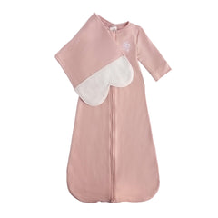 The Butterfly Swaddle in Blushing Pink with wings calms newborn sleep