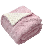 Buttzo baby blanket pink 50x60 close-up shows ultra-soft Minky dot texture for delicate skin.