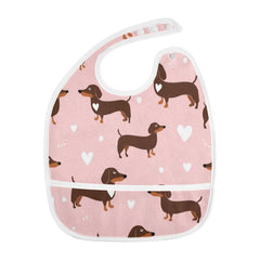 Caikeny bib with pocket catcher to prevent spills from reaching the floor.