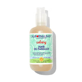 California Baby Calming Hair Detangler Spray bottle pour shows easy dispensing and soothing scent for quick styling.