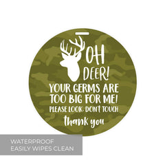 Canopy Street camo deer stop tag on crib for gentle notice about boundaries.