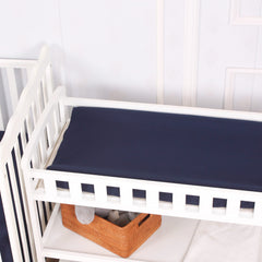 CaSaJa gray changing pad cover highlighting breathable microfiber for baby skin comfort