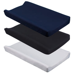 CaSaJa navy changing pad cover on 16x32 pad with snug contoured fit