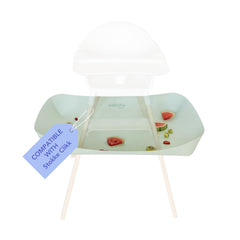 Catchy Food Catcher attached to Stokke Clikk high chair keeps crumbs off the floor