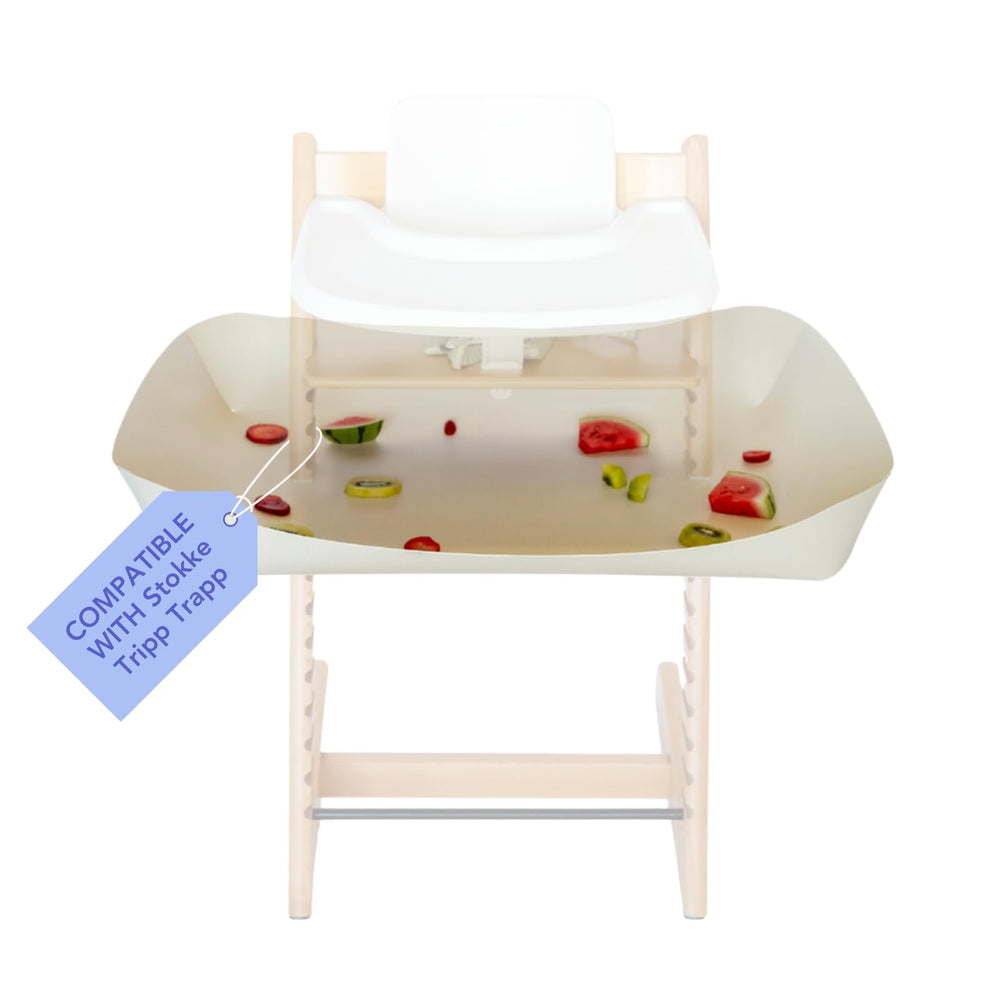 Catchy Food Catcher on Stokke Tripp Trapp protects floors from dropped food.