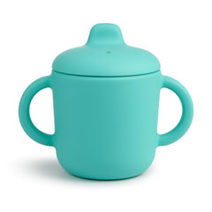 Catii 6 Months+ green-handled sippy cup for easy grip and learning.