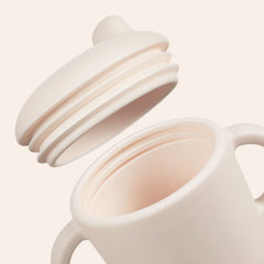 Catii transition cup supports natural toddler drinking progress.