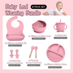 Catvegue pink divided plate keeps foods separate for self-feeding practice.