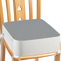 CAVWVTYU booster seat shows 4-point anchor straps securing a kitchen chair for stability.