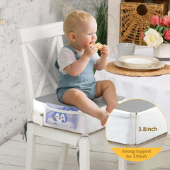 CAVWVTYU booster seat with side pockets for wipes and toys.