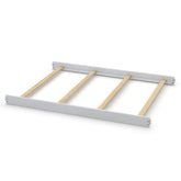 CC KITS full-size conversion bed rails in Silver Mist enable a smooth crib-to-bed transition.