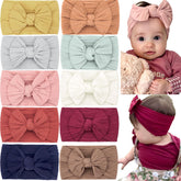 Celllot 10pcs soft knot headbands with bows, gentle elasticity ideal for newborn and infant use.