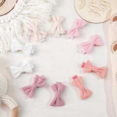 CÉLLOT soft fabric bows prevent snagging while keeping outfits cute.