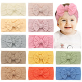 CÉLLOT headbands with bows offer gentle stretch for newborns.