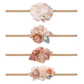 Cherrboll pink flower headband for newborns, ultra soft nylon for gentle wear.