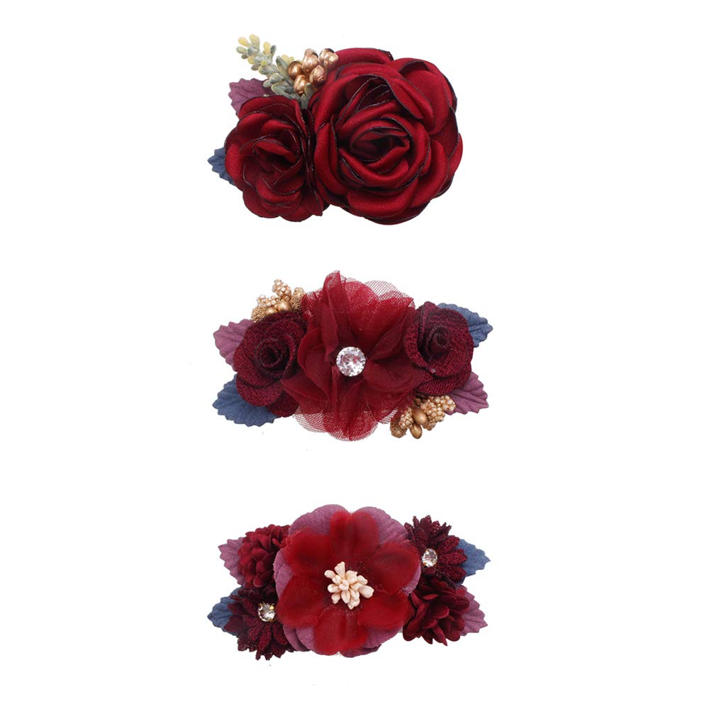 Cherrboll pink-petal flower clip enhances newborn styling with soft color.