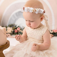 Cherrboll flower headband on baby shows comfortable elastic band.