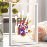 CHERRY CHEERS family handprint kit frame setup shows a display-ready keepsake