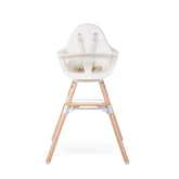 Childhome Evolu One 180° swivel in action for flexible feeding.