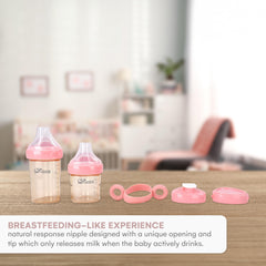 Childlike Behavior 8oz anti-colic bottle pink with venting for calmer feedings.