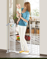 Cideny 34-inch baby gate on stairs for enhanced containment.