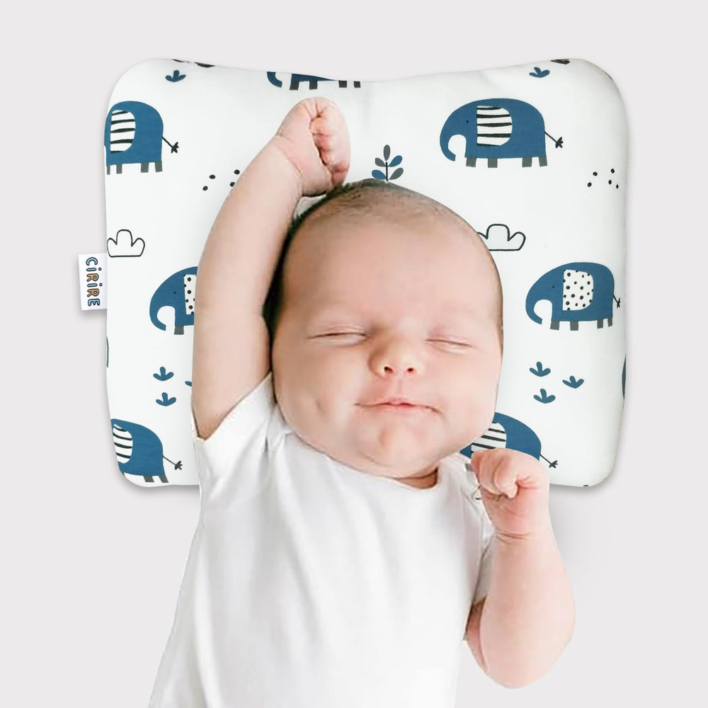 Cirire unisex baby pillow with organic cotton cover offers gentle head support.