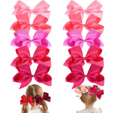 Clipband hair bows with black grosgrain ribbon and secure alligator clips for daily wear.